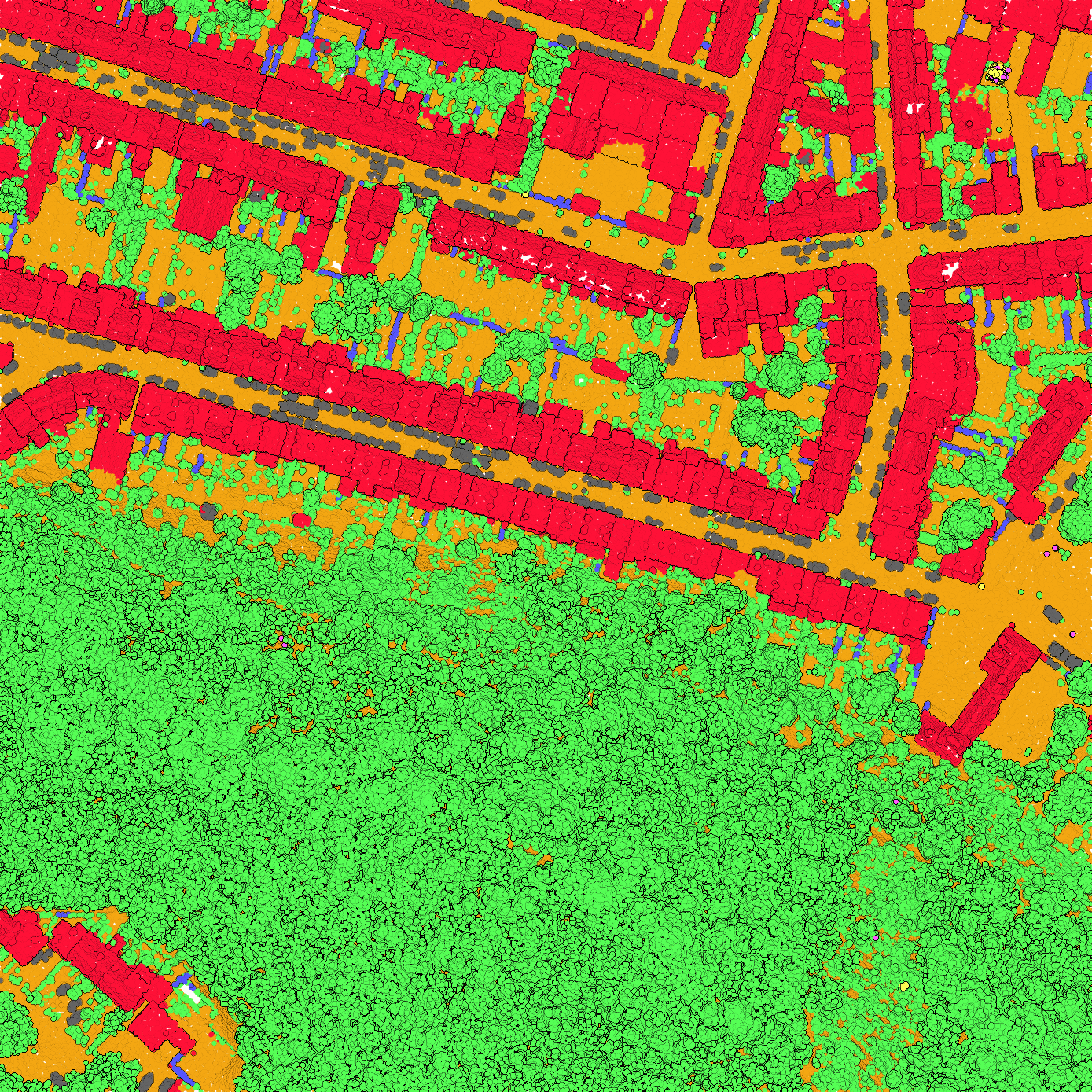 Top-down view of a classified point cloud, with red buildings, green vegetation and orange ground.