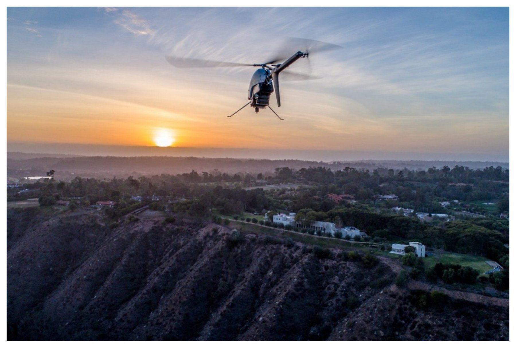 A rotary-wing UAV LiDAR platform in flight.